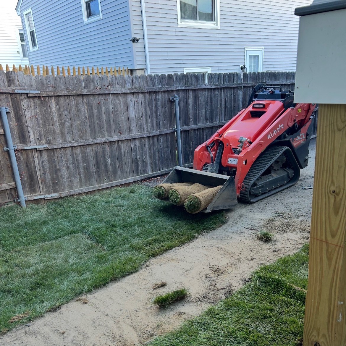 Fresh loam and hydroseed installation